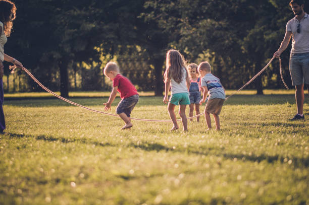 istock Group of children playing in public park 1087444824