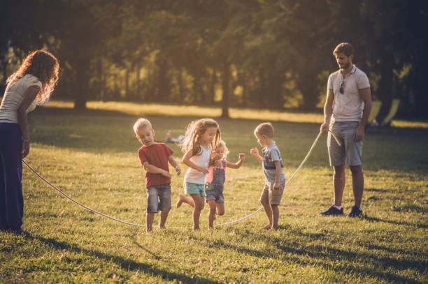 istock Group of children playing in public park 1087445494