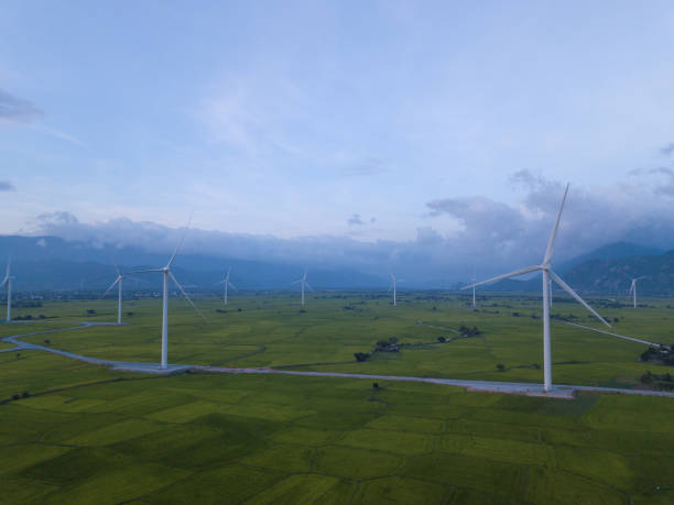 istock Wind turbine farm, windmill on a summer sky 1087450402