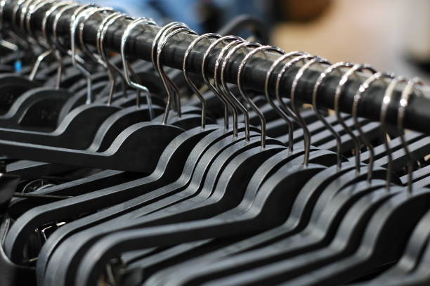 istock hangers on the shelf in the store 1087470100
