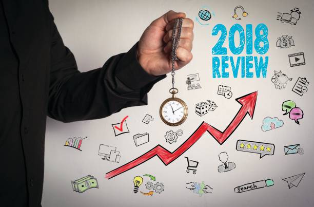 istock 2018 review concept. Red Arrow and Icons Around 1087484002