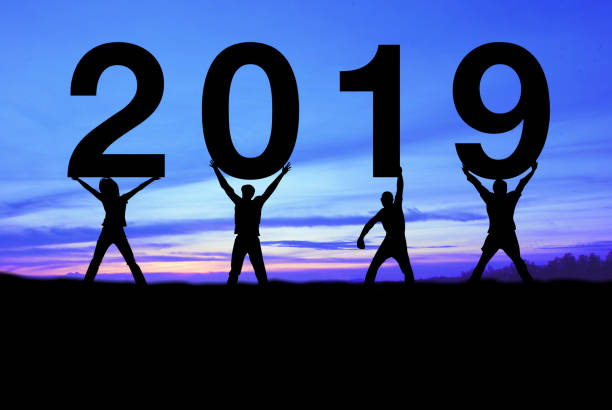 istock 2019 new year concept. Silhouette number on the hill. 1087486460