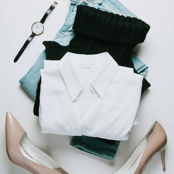 istock Women's clothing on a pale background. Flat lay and top view 1087487000