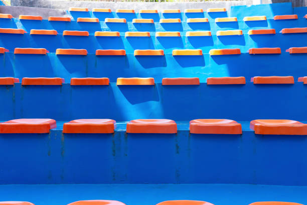 istock lines of blue stadium seats 1087487014