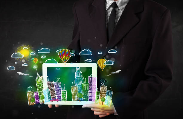 Young person showing tablet with hand drawn cityscape