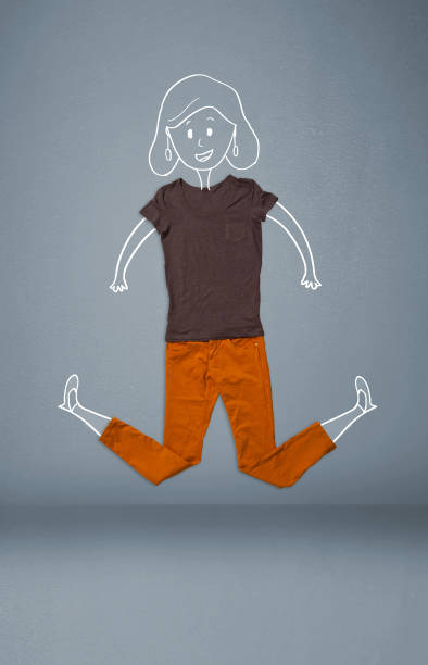 istock Placed clothes in action with woman drawing 1087510212