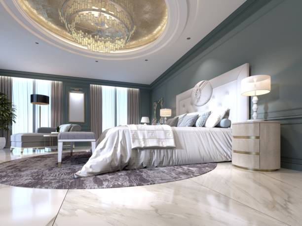 istock Elegant bedroom interior with large comfortable bed and sofa with dressing table. 1087512428