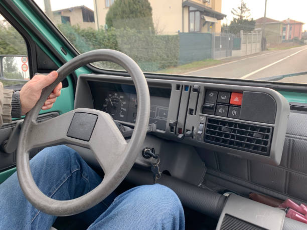 istock Man drive old Italian Car 1087513836