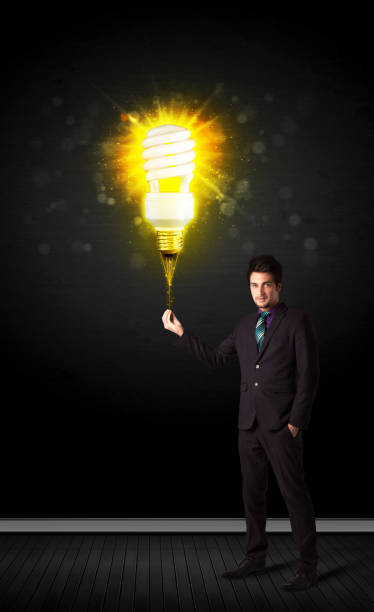 istock Businessman with an eco-friendly bulb 1087513908