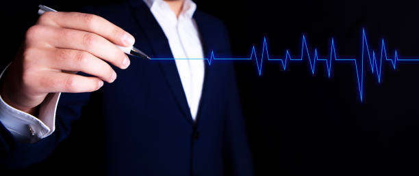istock businessman shows a cardiogram 1087518014