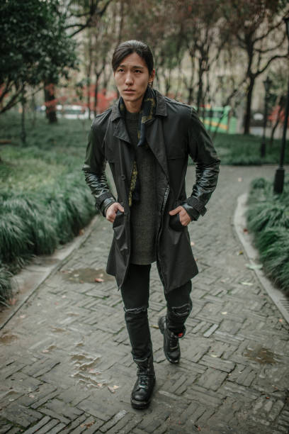 istock Asian man walking in the park 1087522204