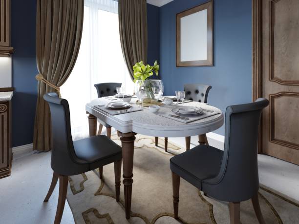 istock Dining room in classic and luxury style, with dining served table with decorative elements, four upholstered chairs, two chandeliers and island with decor. 1087524284