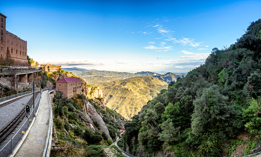 Panoramic view of Montserrat monastery and the geology formations in the mountains, Barcelona, Spain