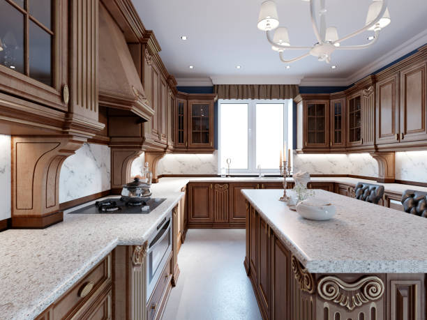 istock Luxury kitchen with tile floor, stained cabinets and marble counter top. 1087525012