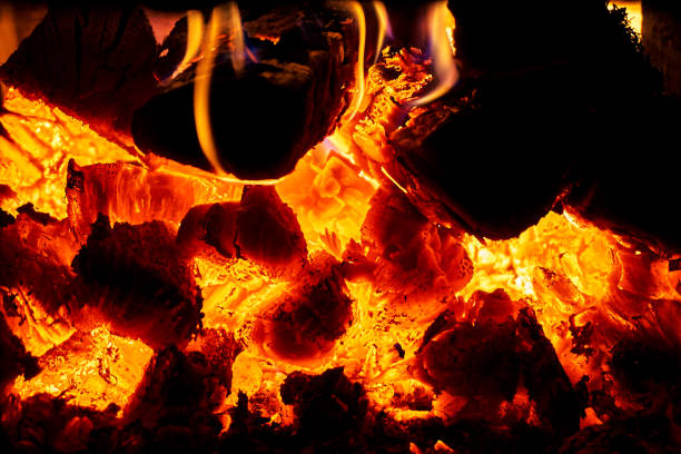 istock Orange flame from burning oak wood in a Russian stove. 1087526420