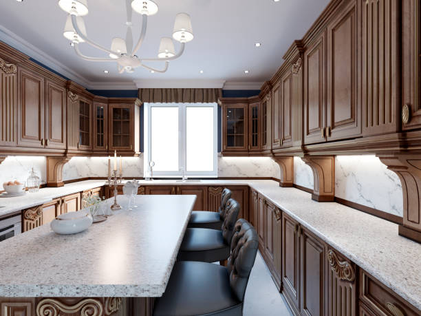 istock Luxury kitchen with tile floor, stained cabinets and marble counter top. 1087529456