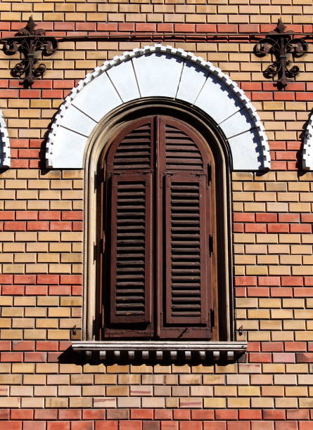 istock Venetian style window with wooden covers 1087531590
