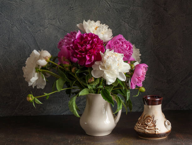 istock Still life with white and pink peonies. 1087534162