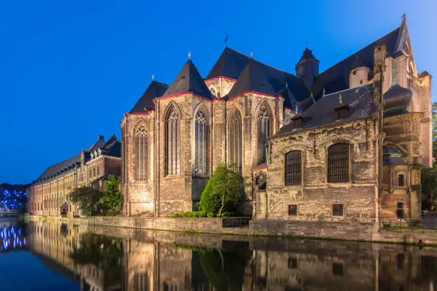 Photo of Saint Michael's church in Ghent at sunset, Belgium historic city.