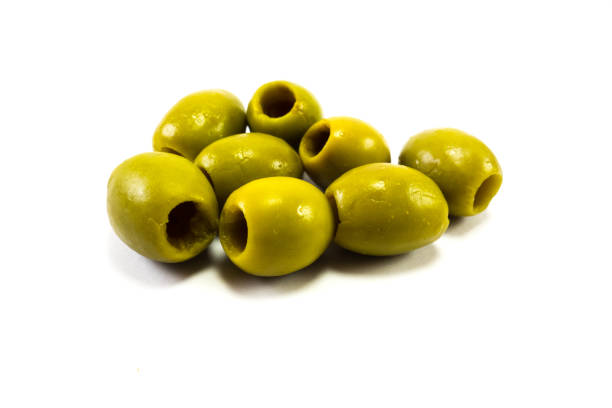 istock Green olives without stone isolated on white background 1087536672