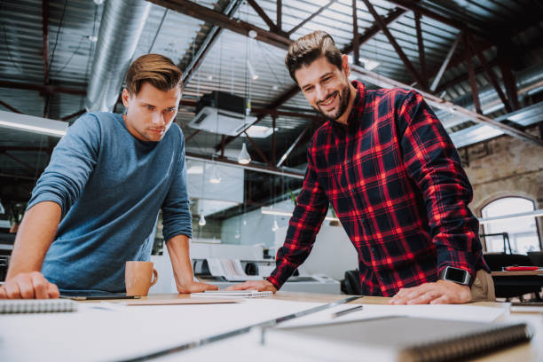 istock Two best students of architectural faculty in office 1087547608