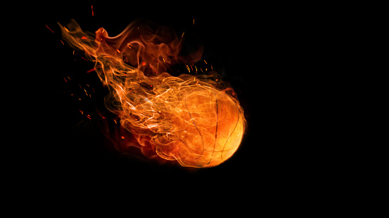 bright flamy symbol on the black background. basketball ball in fire. The sport, game, speed concept