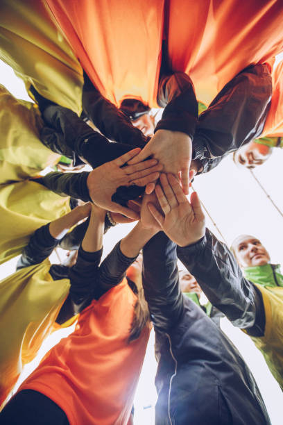 istock Female soccer team huddling 1087549888
