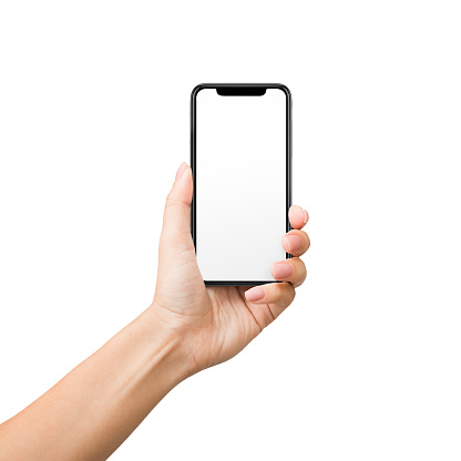 Mujer sosteniendo teléfono móvil con pantalla en blanco sobre fondo blanco photo