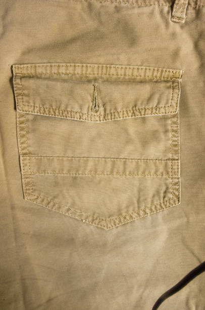 istock clothing items washed cotton fabric texture with seams 1087555440
