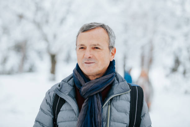 istock Mature Man Enjoying a Winter Hike 1087557830
