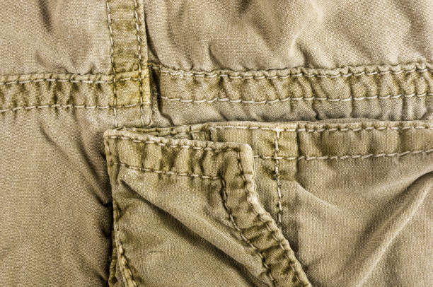 istock clothing items washed cotton fabric texture with seams 1087558148