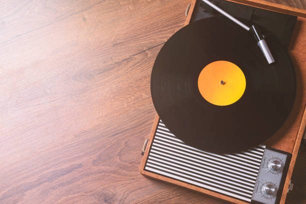 istock amazing older Gramophone with a vinyl record 1087558730