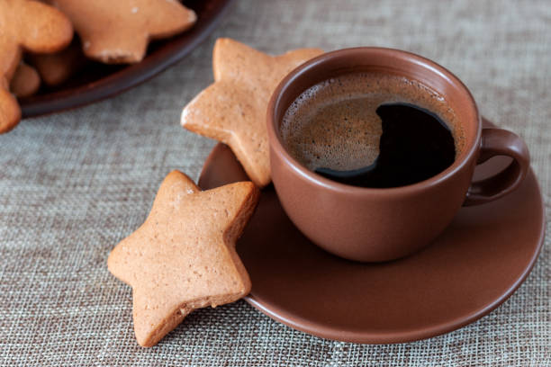 istock On the table is a cup of coffee with gingerbread 1087561326