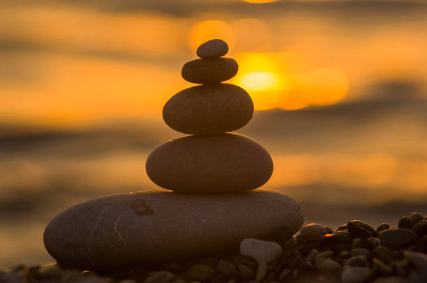 istock stack of zen stones on pebble beach 1087563358