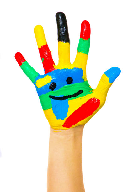 istock Laughing colorful child hand to the right 1087565744