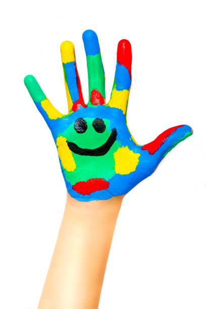 istock Laughing colorful child hand to the right 1087565766