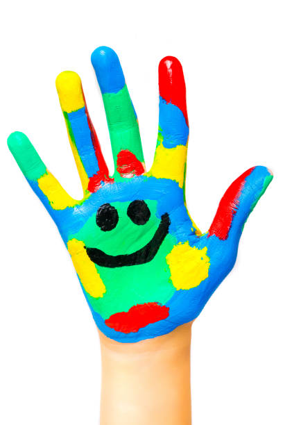 istock Laughing colorful child hand to the right 1087565798