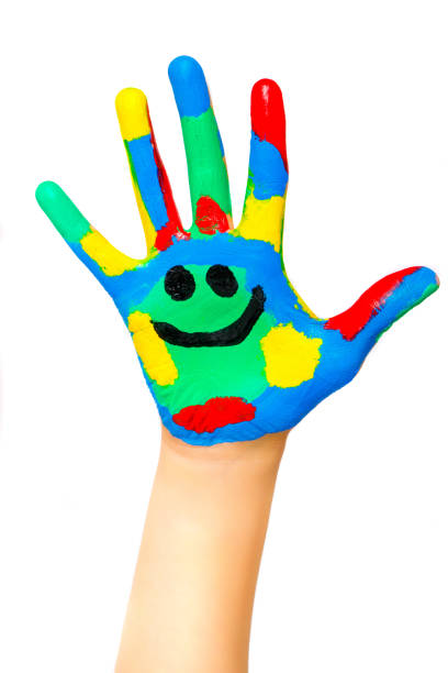 istock Laughing colorful child hand to the right 1087565854
