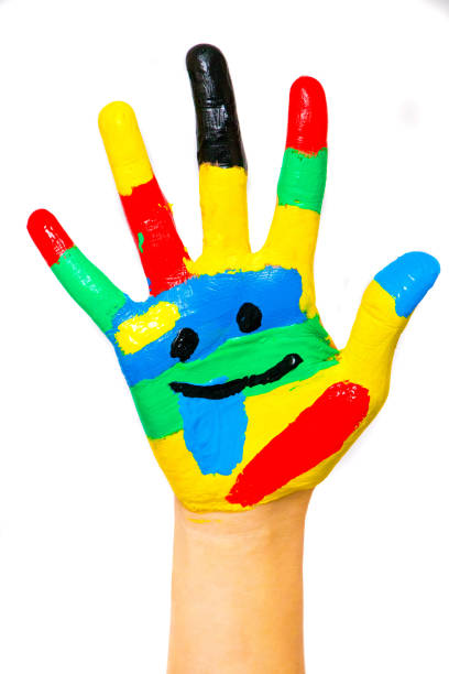 istock Laughing colorful child hand to the right 1087565866