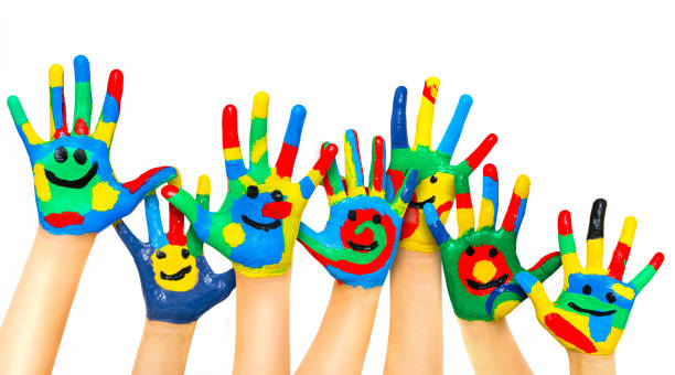 many coloured children hands - brushing human hand paintbrush artist imagens e fotografias de stock