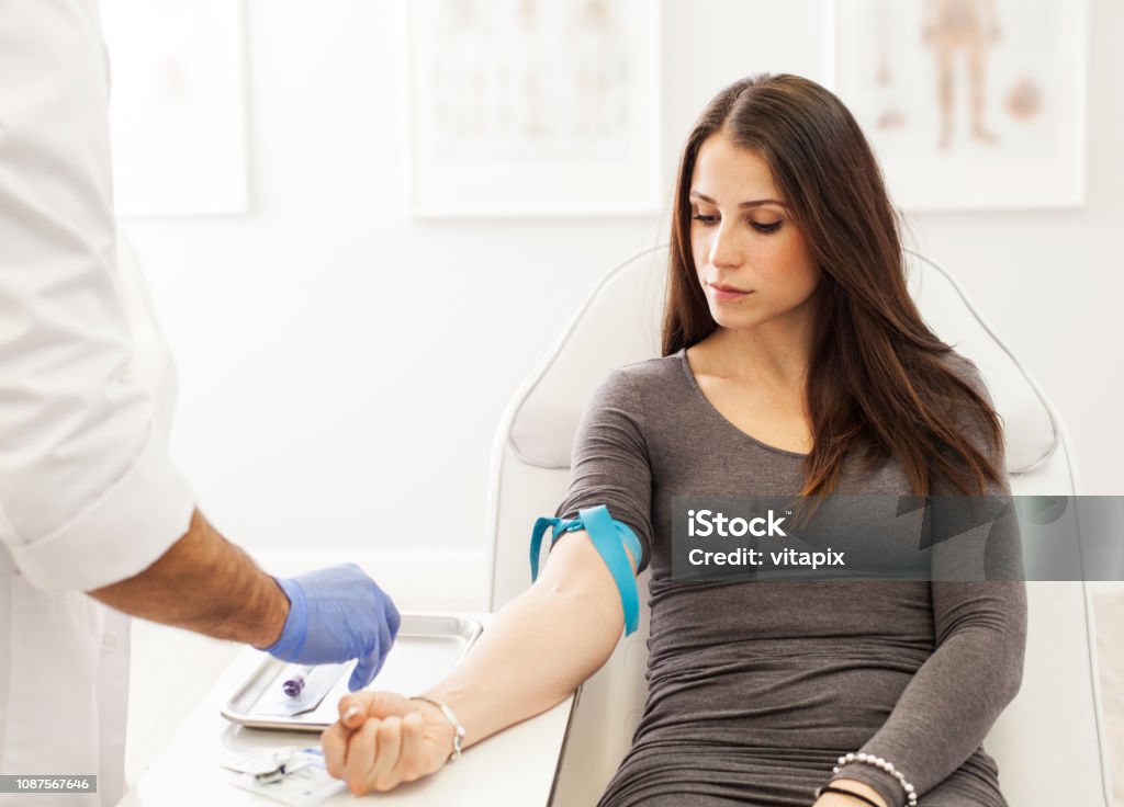 Blood Drawing for PRP treatment Professional medical office blood drawing through a thin needle, preparing for platelet rich plasma treatment Blood Test Stock Photo