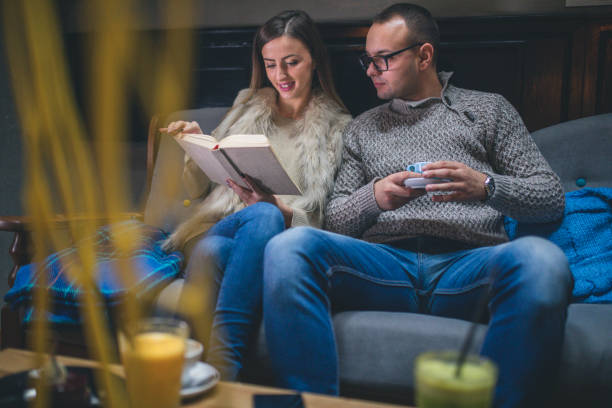 istock Couple Of Students Learning At Home On A Sofa 1087578424