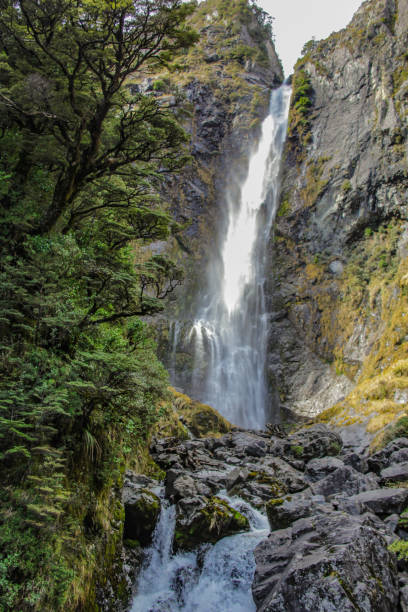 istock Devil's Punchbowl Waterfall in Arthur's Pass National Park, New Zealand 1087580328