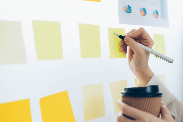 istock Business people meeting and use post it notes to share idea. 1087580426