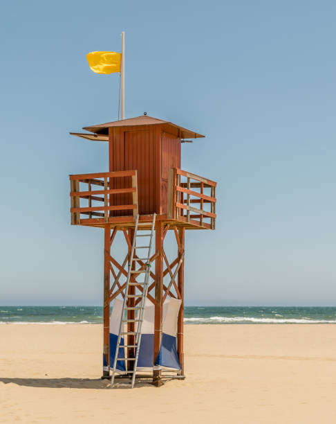 istock Wooden Lifeguard Tower on an empty beach 1087587272