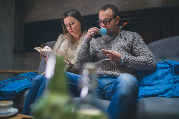 istock Couple Of Students Learning At Home On A Sofa 1087589906