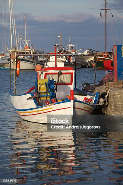 Little Greek Fishing Boat In The Morning Light Stock Photo - Download Image Now - Autumn, Bay of Water, Blue