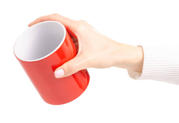 istock Red cup mug in female hand 1087597554