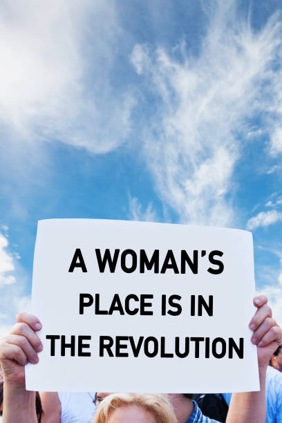 istock Woman Holding a Protest Sign 1087610868