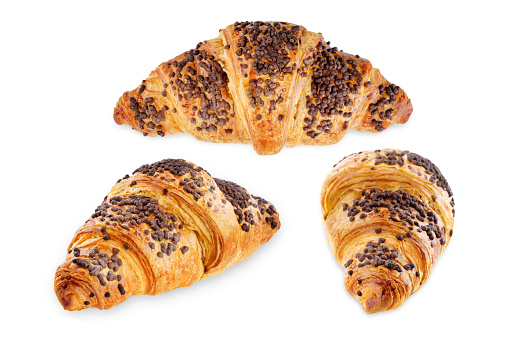 Chocolate croissants with chocolate sprinkles isolated. toning. selective focus